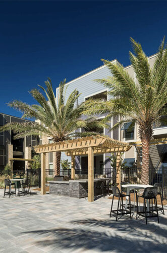 Outdoor lounge featuring a grilling station