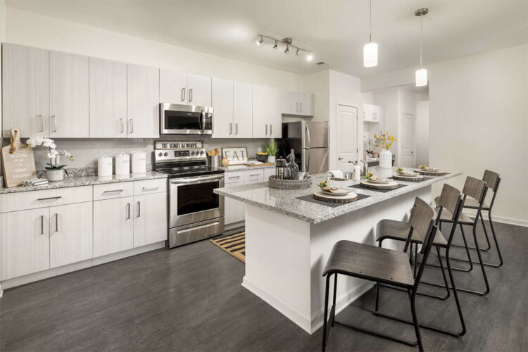 Kitchen furnished with stainless steel appliances